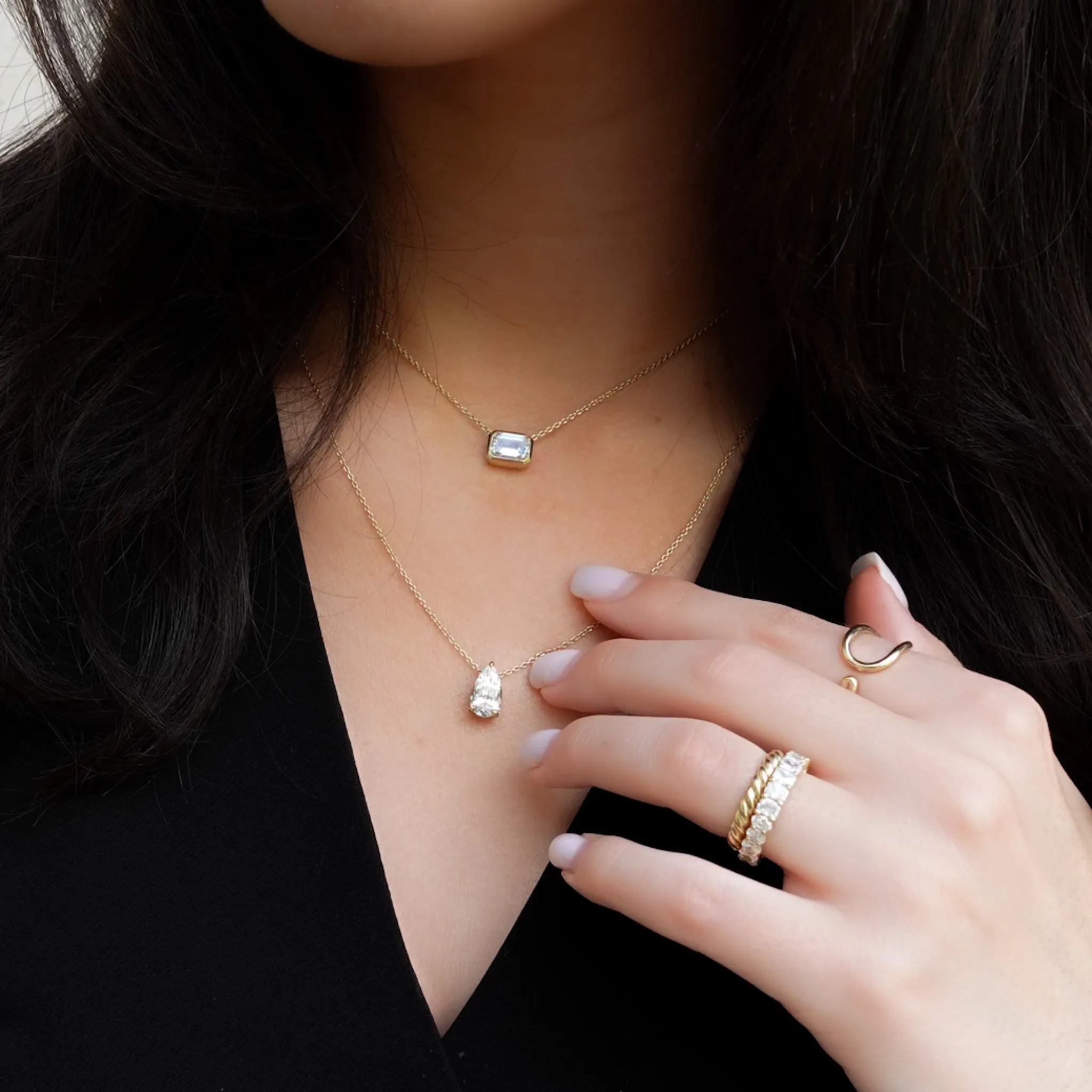 East West Bezel Pendant Necklace with Emerald Cut Diamond