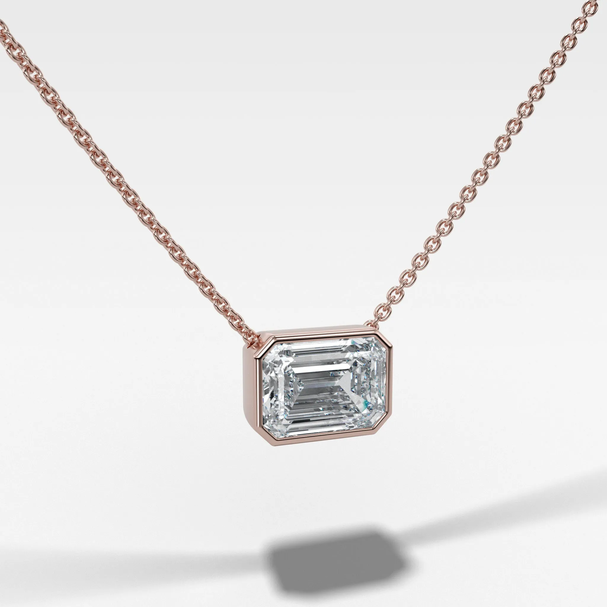East West Bezel Pendant Necklace with Emerald Cut Diamond