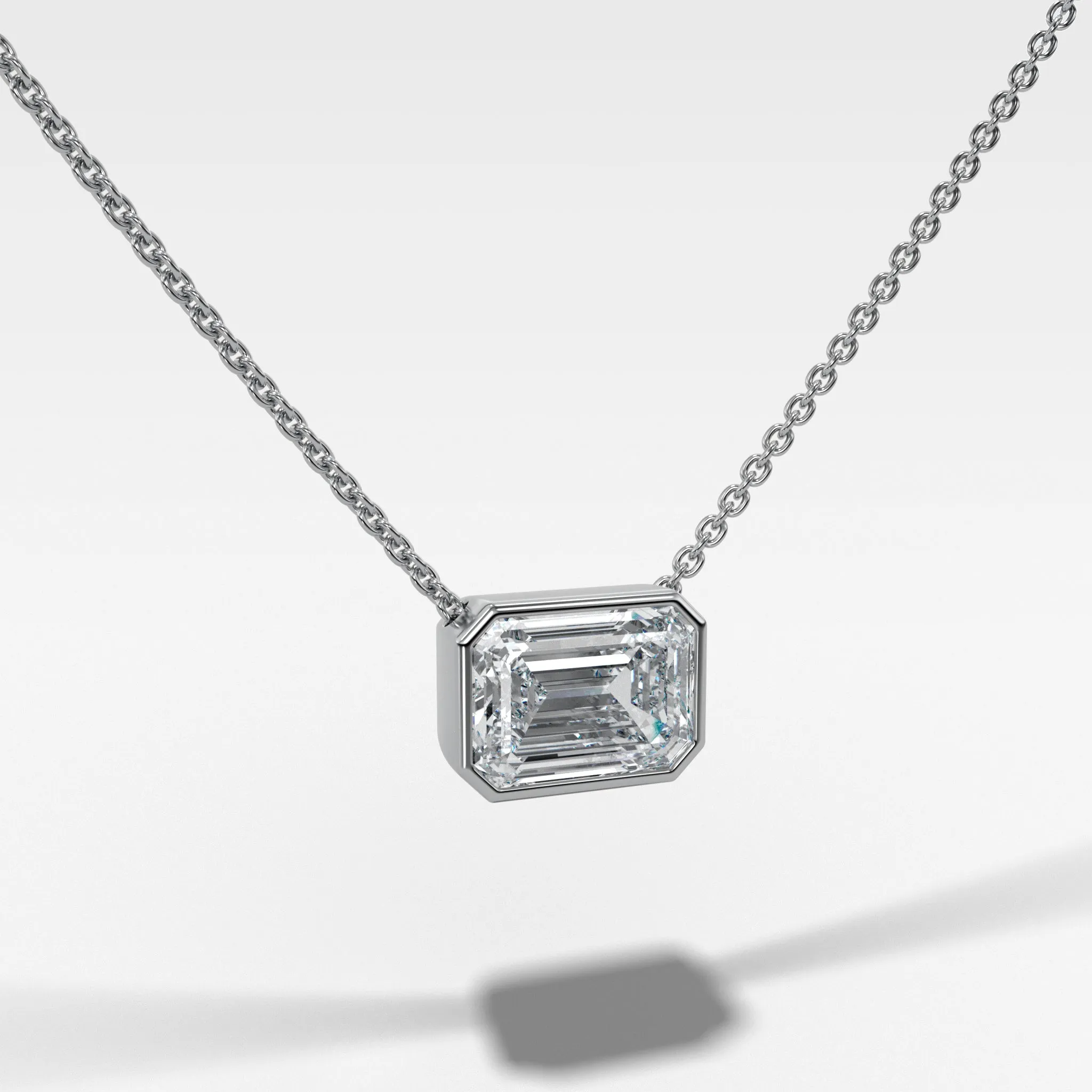East West Bezel Pendant Necklace with Emerald Cut Diamond