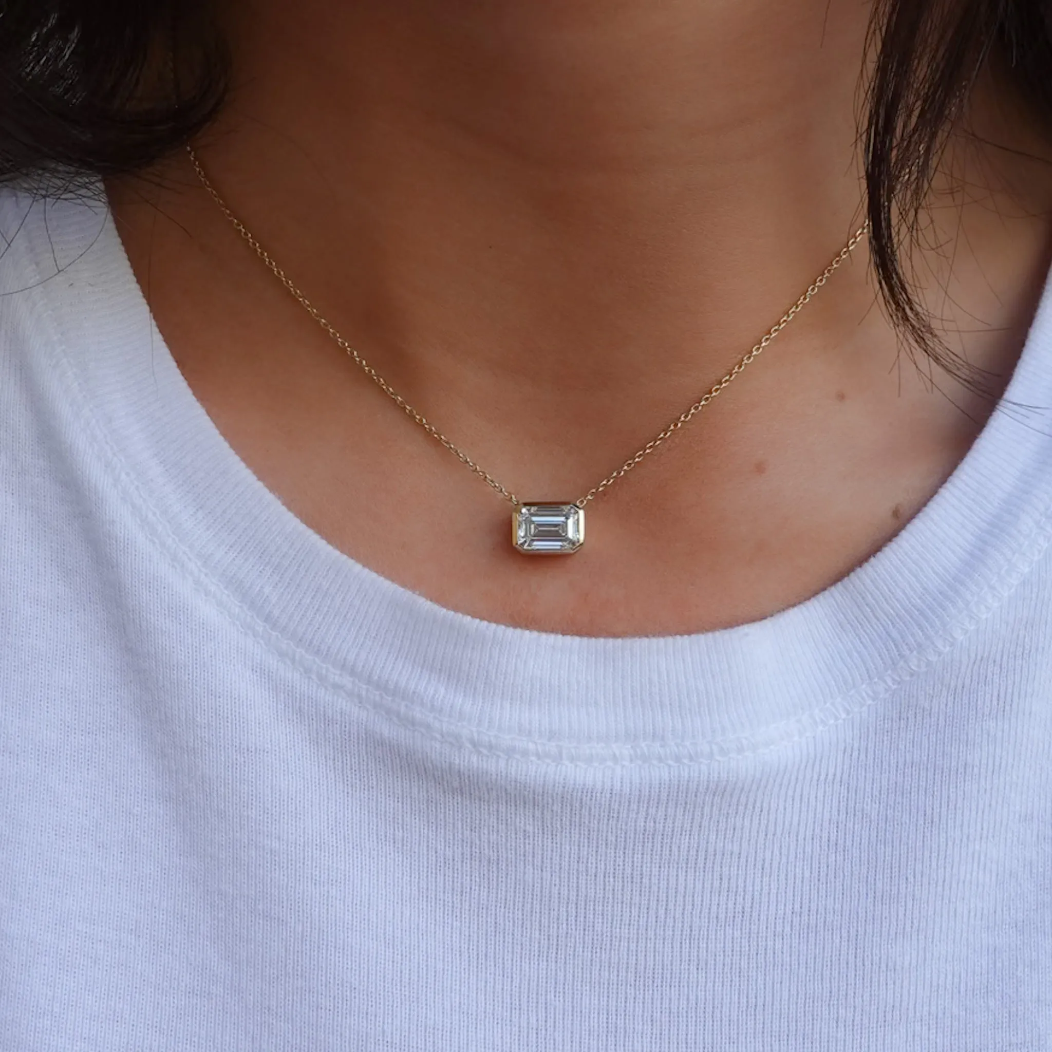 East West Bezel Pendant Necklace with Emerald Cut Diamond