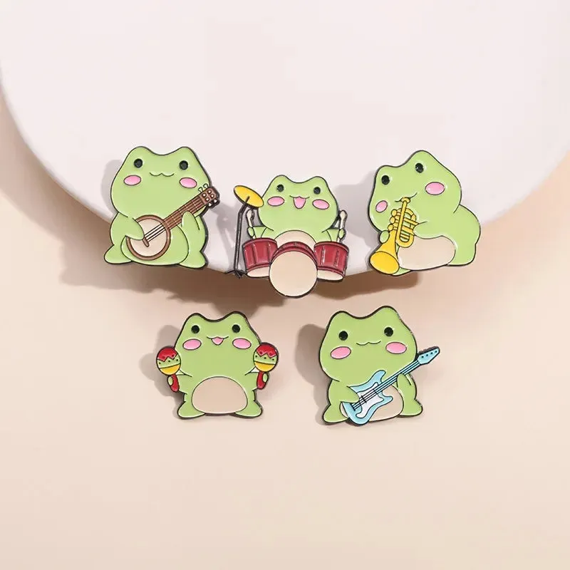 Kawaii Cartoon Frog Band Enamel Pins 🎶🐸 | Fun Drum & Guitar Brooches for Kids & Friends 🎸✨ | Cute Lapel Badges & Jewelry Gift