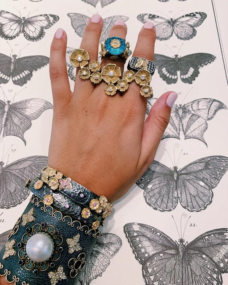 PRIMROSE PATH THREE-FINGER STATEMENT RING