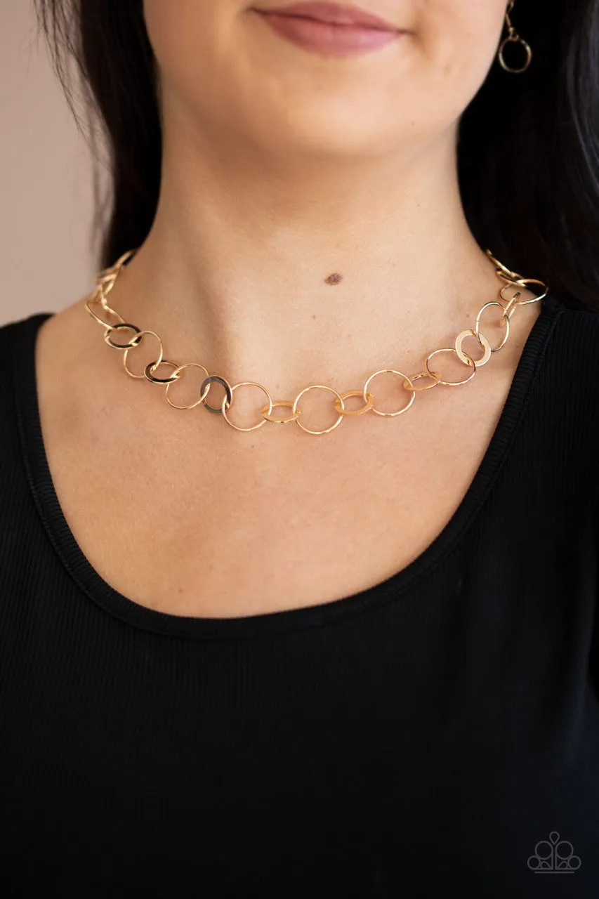 Revolutionary Radiance Gold Paparazzi Necklace