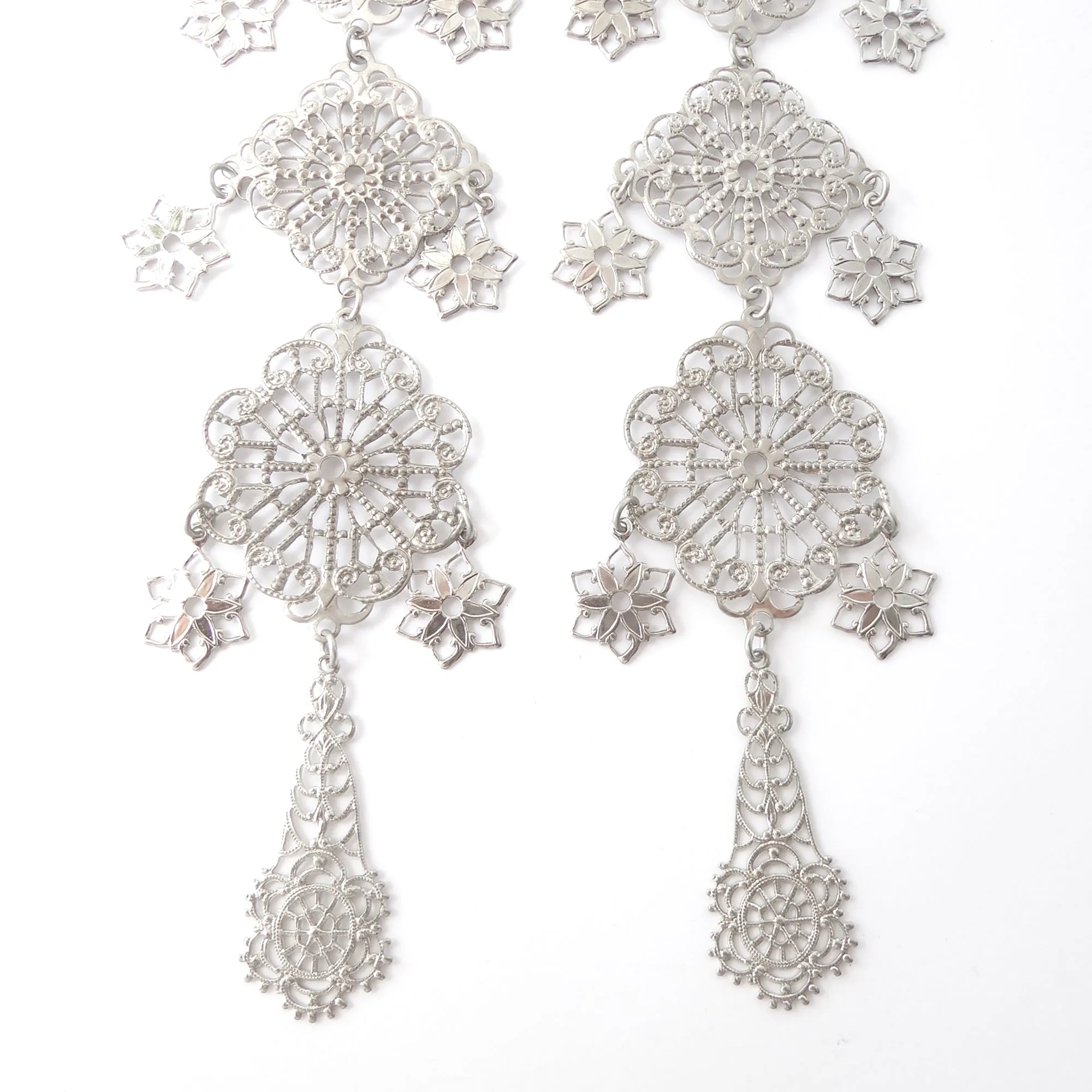 Silver long estrella earrings