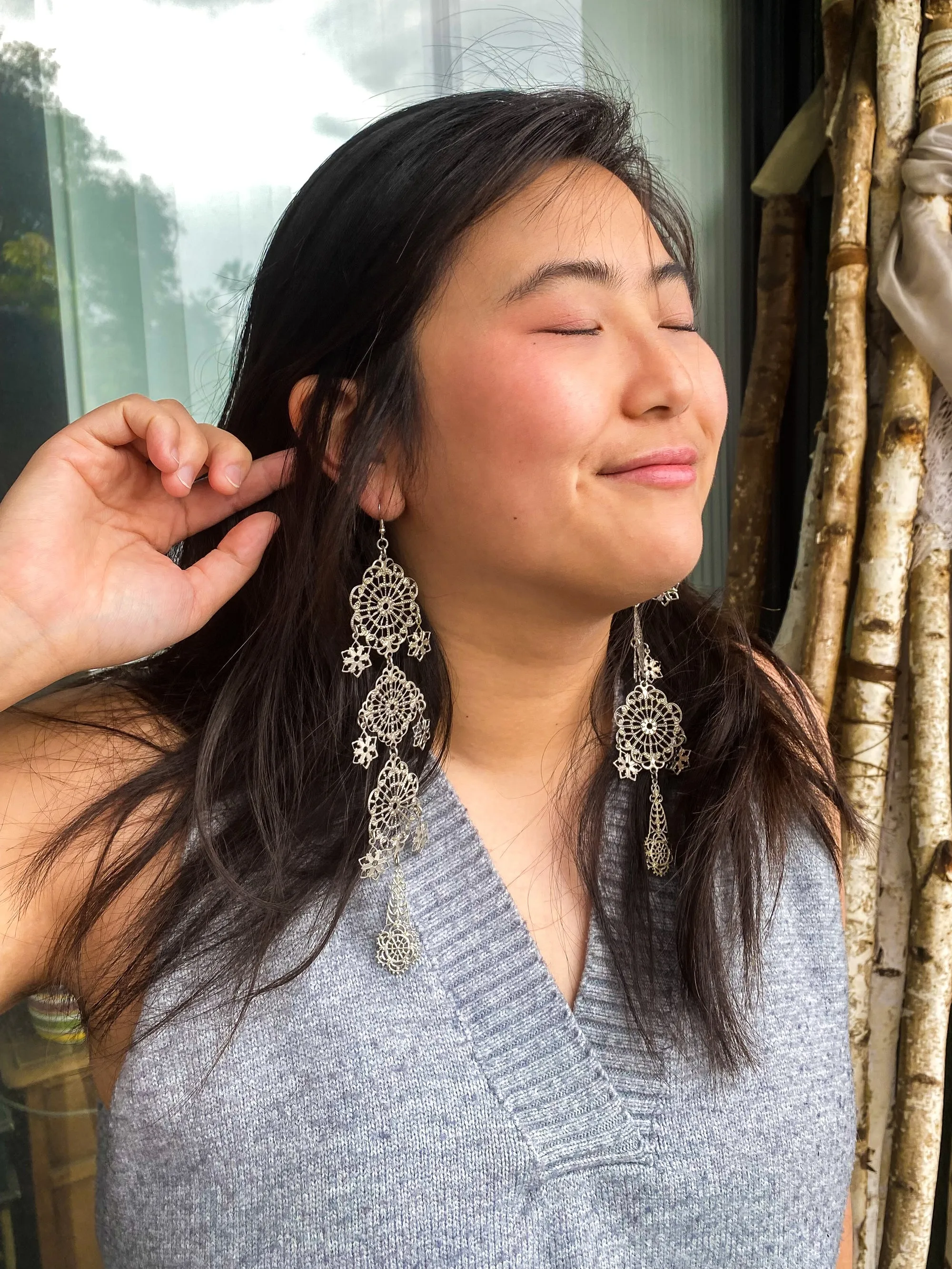 Silver long estrella earrings