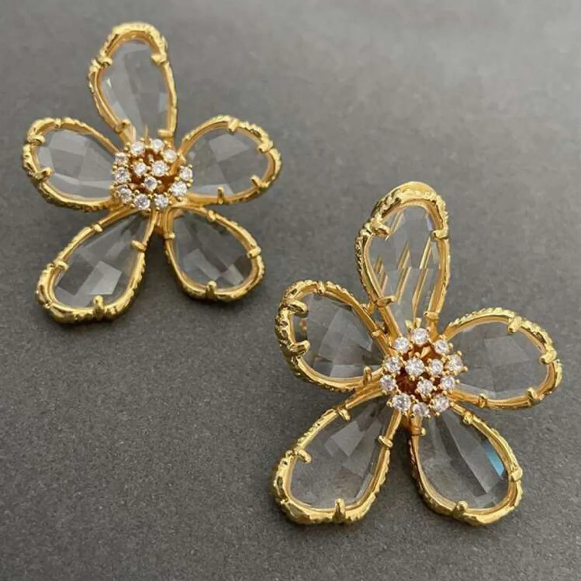 TRANSLUCENT FLORAL STUDS