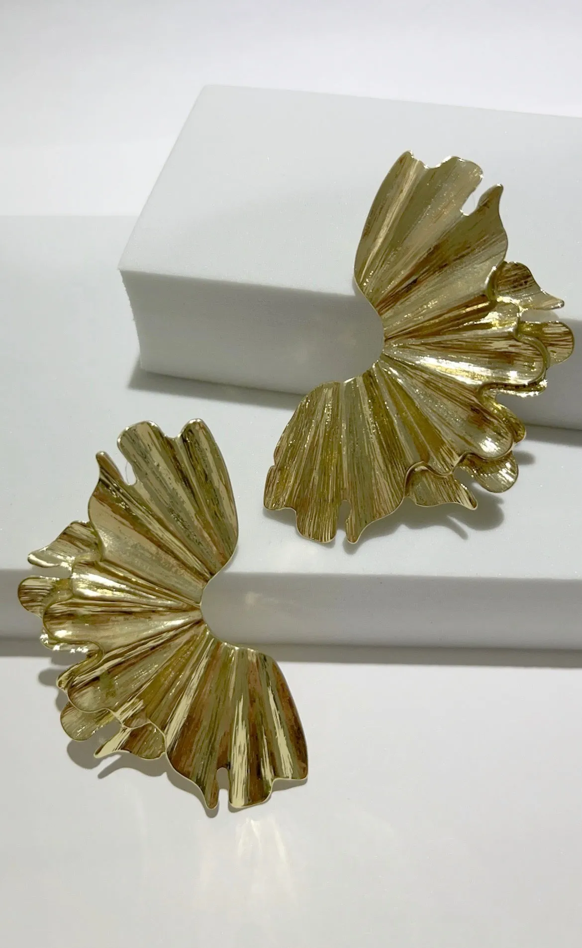 What a Statement Piece Gold Earrings