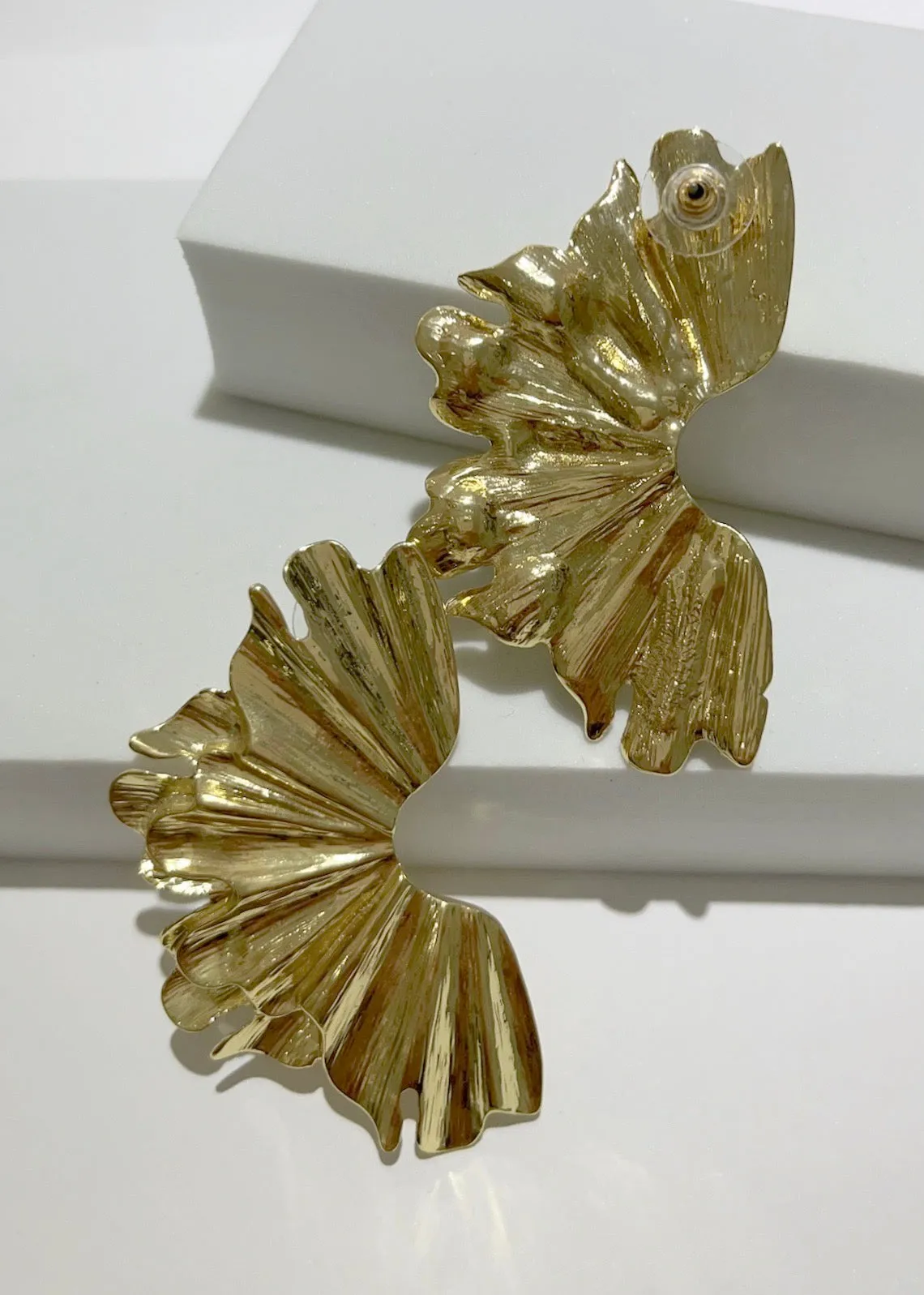 What a Statement Piece Gold Earrings